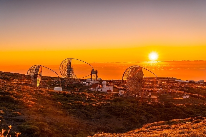 The new astronomical observatory of the Caldera de Taburiente in a beautiful orange sunset, La Palma, Canary Islands. Spain, by Unai Huizi