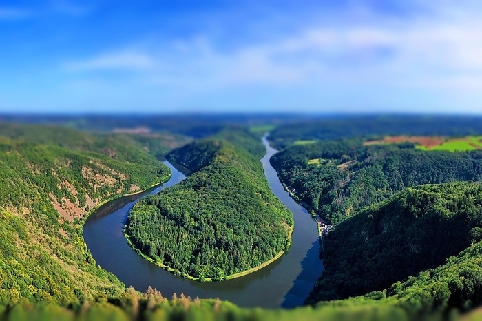 Aerial view of the Saar Loop. The Saar winds through the valley and is surrounded by green forests. Orscholz, Mettlach, Saarland, Germany, Europe, by fotoping