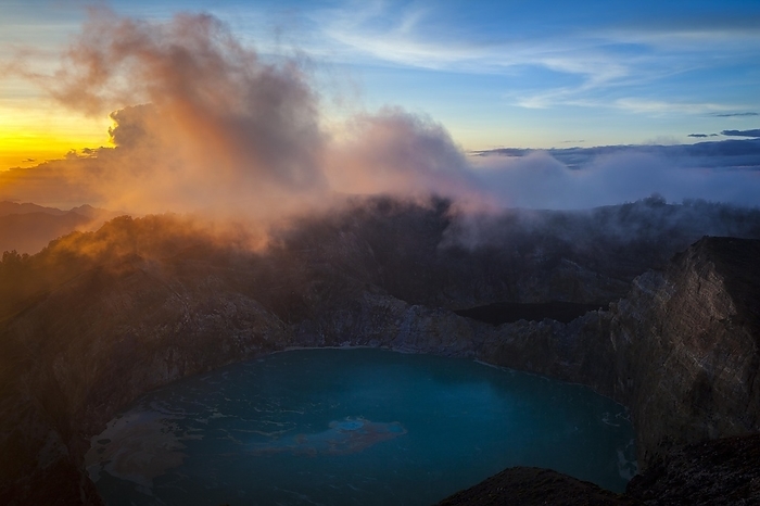 Sunrise at Kelimutu Volcano, fog over crater with crater lake, Kelimutu National Park, Flores, Nusa Tenggara Timur, Indonesia, Asia, by Bernd Bieder
