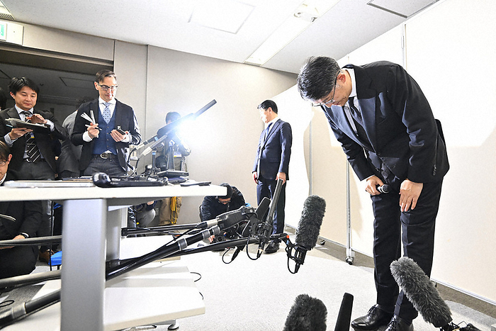 Toyota Motor Corporation President Tsuneji Sato bows his head when interviewed by reporters. Toyota Motor Corporation President Tsuneji Sato bows to reporters at 7:36 p.m. on January 29, 2024, in Bunkyo ku, Tokyo  photo by Ririko Maeda.