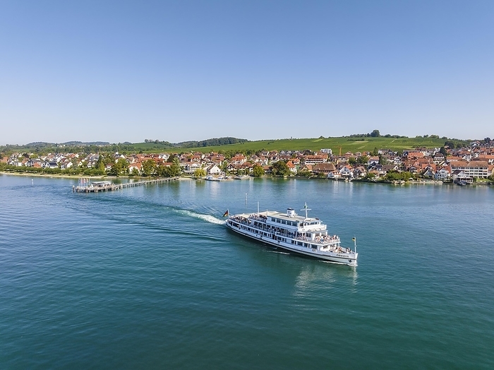 Aerial view of the Lake Constance municipality of Hagnau with the landing stage and the departing scheduled ship MS Swabia of the Lake Constance-Schiffsbetriebe, Weiße Flotte, Lake Constance district, Baden-Württemberg, Germany, Europe, by Markus Keller