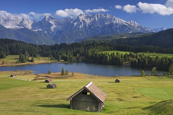The Karwendel Mountain Range and huts along lake Gerold, Geroldsee near Mittenwald, Upper Bavaria, Germany, Europe, by alimdi / Arterra / Sven-Erik Arndt