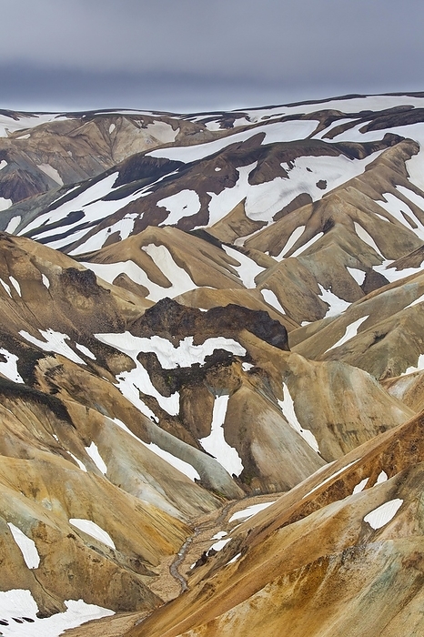 Iceland Sulphur coloured rhyolite mountains with patches of snow at Brennisteinsalda volcano near Landmannalaugar, Fjallabak Nature Reserve, Sudurland, Iceland, Europe, by alimdi   Arterra   Sven Erik Arndt