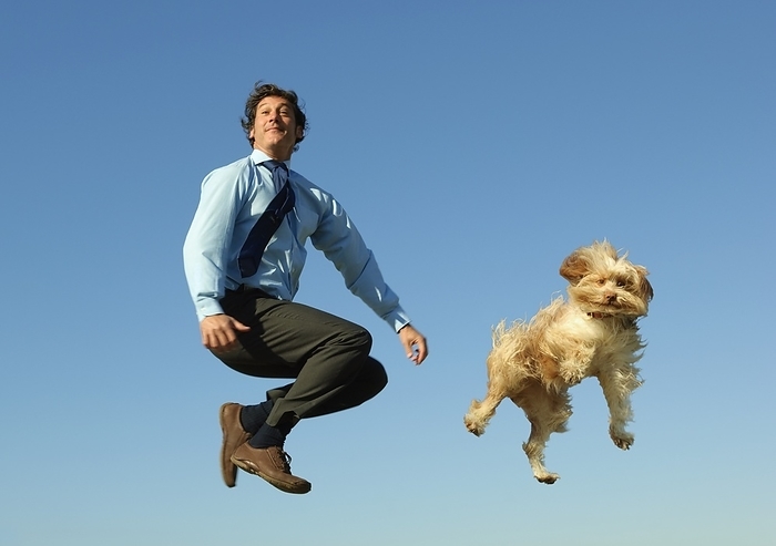 Man Jumping In Air With Dog, by Ben Welsh / Design Pics