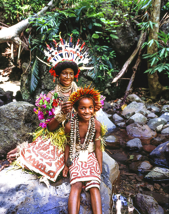Papua New Guinea Woman With Tattooed Face And Young Boy In Traditional Dress  Tufi, Papua New Guinea, by David Kirkland   Design Pics