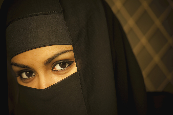 Brunei Portrait Of A Woman Wearing A Black Burka  Brunei, by David Kirkland   Design Pics