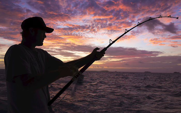 Fishing At Sunset; Marshall Islands, by David Kirkland / Design Pics
