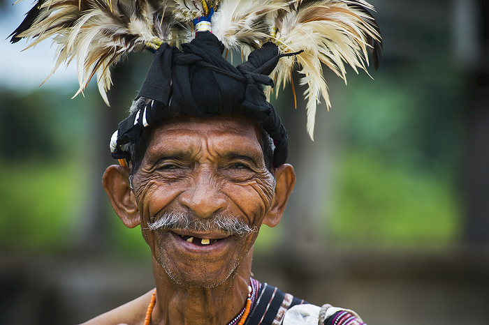 Elderly Man In Traditional Attire; Lospalmos District, Timor-Leste, by David Kirkland / Design Pics