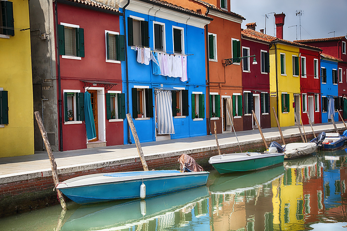 Venice A Row Of Brightly Coloured Houses Sit Along A Canal With Boats  Burano, Venice, Italy, by Jenna Szerlag   Design Pics