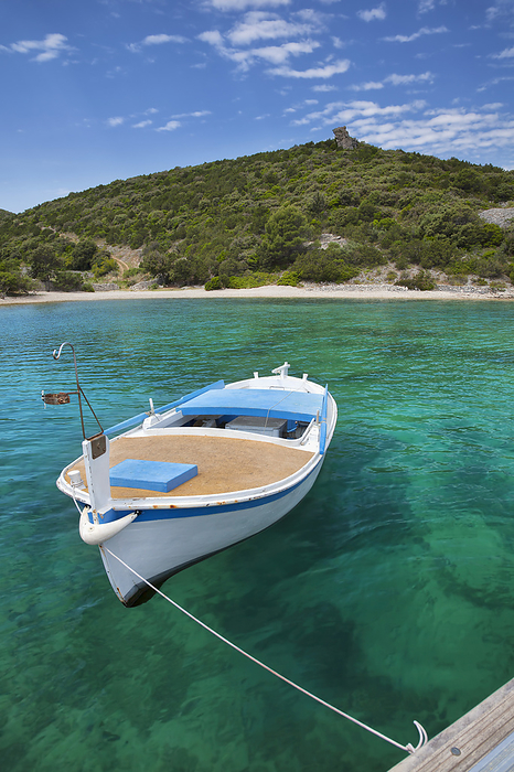 Croatia A Boat Rests In Clear Water On The Island Of Brac  Povlja, Island Of Brac, Croatia, by Jenna Szerlag   Design Pics