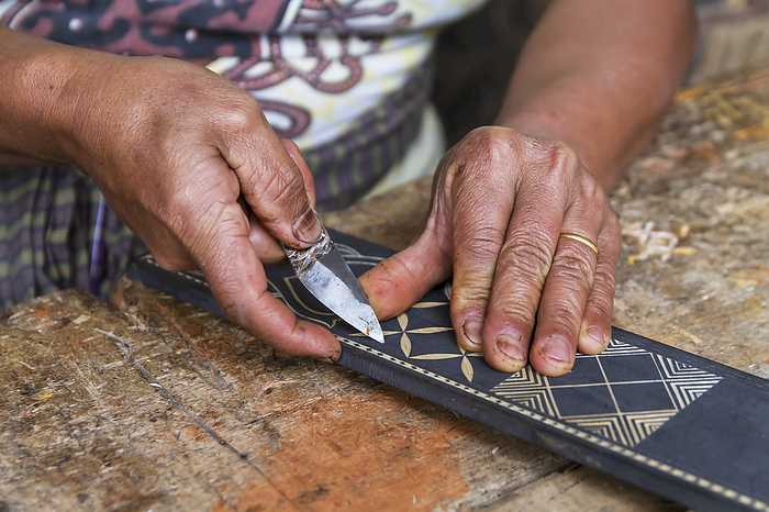 Indonesia Man Carving A Traditional Toraja Design On Piece Of Wood, Kete Kesu, Toraja Land, South Sulawesi, Indonesia, by Peter Langer   Design Pics