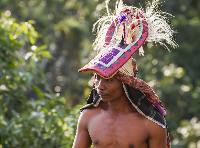Indonesia Manggarai Man Wearing A Traditional Headdress Wrapped With Cloth Used In Caci, A Ritual Whip Fight , Melo Village, Flores, East Nusa Tenggara, Indonesia, by Peter Langer   Design Pics