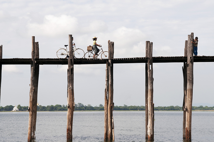 Myanmar Riding Bicycles On An Elevated Wooden Bridge Over Taungthaman Lake  Amarapura, Myanmar, by Elena Roman Durante   Design Pics