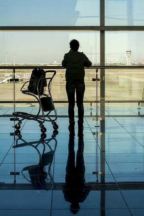 Barcelona, Spain Silhouette Of Traveller At Barcelona Airport  Barcelona, Spain, by Dosfotos   Design Pics