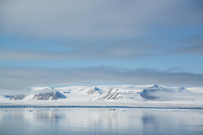 Desolate island coast in the Hinlopen Strait; Svalbard, Norway, by Michael Melford / Design Pics