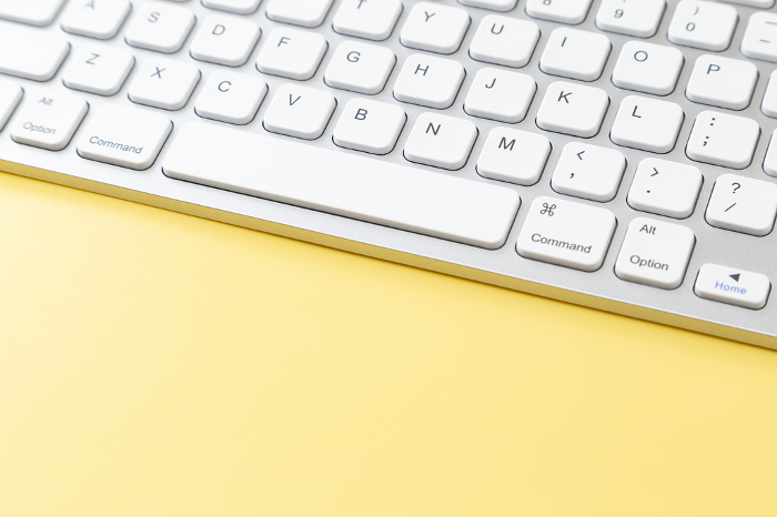 Keyboard on yellow background