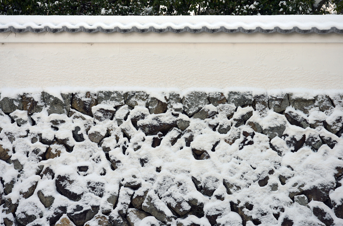 Mud wall of stone wall in the precincts of Tofukuji Temple in snow Higashiyama-ku, Kyoto