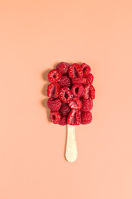 Healthy ice cream from fresh raspberries. Pantone color 2024, by Cavan Images / Galigrafiya