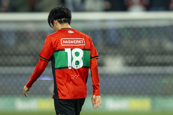 Netherlands: NEC vs Heracles Almelo NIJMEGEN, Stadium De Goffert, 03 02 2024 , season 2023   2024 , Dutch Eredivisie. during the match NEC   Heracles,final result 3 1, NEC Nijmegen player boki Ogawa with special shirt with Braille name on it for the Blind person stands in NEC Stadium 