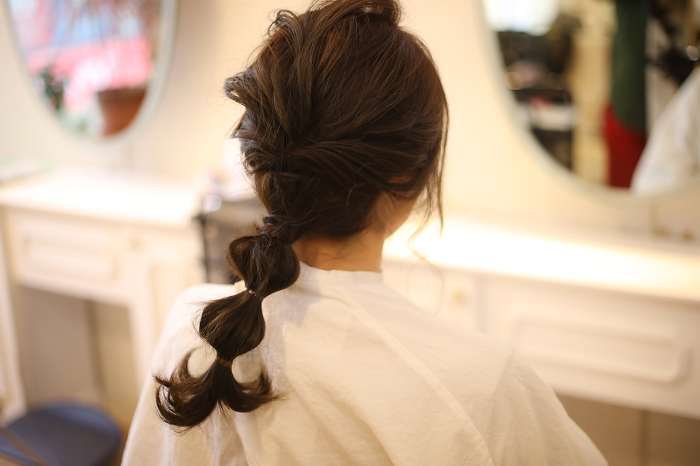 Back view of a woman Beauty Parlor Image