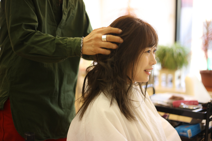 Woman getting her hair done at a hair salon