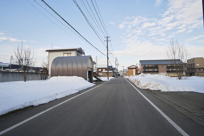 Photo taken in 2024 Snow dumped on plowed roads and rice fields January 2024 Minamiuonuma City, Niigata Prefecture