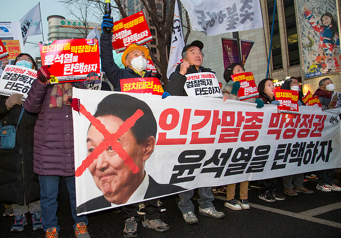 South Korean people demand the impeachment of President Yoon Suk Yeol in Seoul Protest demanding the impeachment of President Yoon Suk Yeol, Jan 27, 2024 : South Koreans hold a protest demanding the impeachment of President Yoon Suk Yeol in central Seoul, South Korea. Thousands of people participated in the rally and they insisted President Yoon is incompetent in national economy, defense and diplomacy. Participants demanded Kim Keon Hee, wife of President Yoon, to accept investigation by a special prosecution as they insist the first lady has been manipulating state affairs. Kim came under fire after video footage was released in November 2023 of her receiving a Christian Dior bag, valued at around US 2,200 from a Korean American pastor in September 2022. The placard reads,  Let s impeach Yoon Suk Yeol who is a scum and doomed regime  and pickets read,  Let s impeach Yoon Suk Yeol .  Photo by Lee Jae Won AFLO 