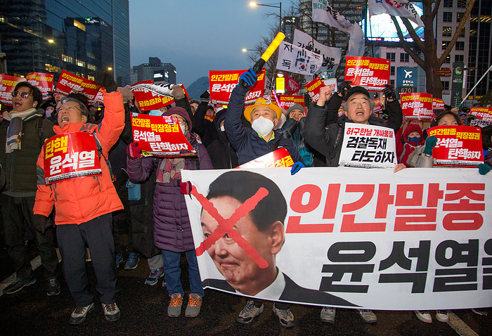 South Korean people demand the impeachment of President Yoon Suk Yeol in Seoul Protest demanding the impeachment of President Yoon Suk Yeol, Jan 27, 2024 : South Koreans hold a protest demanding the impeachment of President Yoon Suk Yeol in central Seoul, South Korea. Thousands of people participated in the rally and they insisted President Yoon is incompetent in national economy, defense and diplomacy. Participants demanded Kim Keon Hee, wife of President Yoon, to accept investigation by a special prosecution as they insist the first lady has been manipulating state affairs. Kim came under fire after video footage was released in November 2023 of her receiving a Christian Dior bag, valued at around US 2,200 from a Korean American pastor in September 2022. The placard reads,  Let s impeach Yoon Suk Yeol who is a scum and doomed regime  and pickets read,  Let s impeach Yoon Suk Yeol .  Photo by Lee Jae Won AFLO 