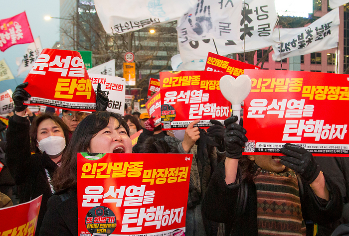 South Korean people demand the impeachment of President Yoon Suk Yeol in Seoul Protest demanding the impeachment of President Yoon Suk Yeol, Jan 27, 2024 : South Koreans hold a protest demanding the impeachment of President Yoon Suk Yeol in central Seoul, South Korea. Thousands of people participated in the rally and they insisted President Yoon is incompetent in national economy, defense and diplomacy. Participants demanded Kim Keon Hee, wife of President Yoon, to accept investigation by a special prosecution as they insist the first lady has been manipulating state affairs. Kim came under fire after video footage was released in November 2023 of her receiving a Christian Dior bag, valued at around US 2,200 from a Korean American pastor in September 2022. The pickets read,  Let s impeach Yoon Suk Yeol who is a scum and doomed regime .  Photo by Lee Jae Won AFLO 