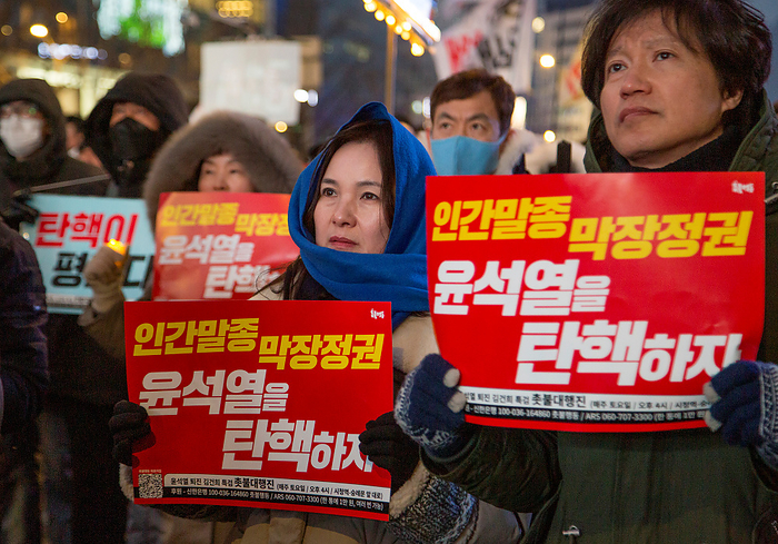 South Korean people demand the impeachment of President Yoon Suk Yeol in Seoul Protest demanding the impeachment of President Yoon Suk Yeol, Jan 27, 2024 : South Koreans hold a protest demanding the impeachment of President Yoon Suk Yeol in central Seoul, South Korea. Thousands of people participated in the rally and they insisted President Yoon is incompetent in national economy, defense and diplomacy. Participants demanded Kim Keon Hee, wife of President Yoon, to accept investigation by a special prosecution as they insist the first lady has been manipulating state affairs. Kim came under fire after video footage was released in November 2023 of her receiving a Christian Dior bag, valued at around US 2,200 from a Korean American pastor in September 2022. The pickets read,  Let s impeach Yoon Suk Yeol who is a scum and doomed regime .  Photo by Lee Jae Won AFLO 