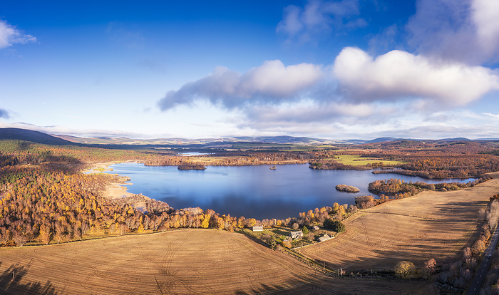 UK, Scotland, Aerial view of fields surrounding Loch Kinord in autumn
