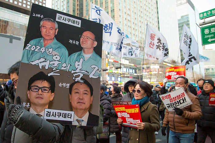 South Korean people demand the impeachment of President Yoon Suk Yeol in Seoul Protest demanding the impeachment of President Yoon Suk Yeol, Jan 27, 2024 : South Koreans hold a protest demanding the impeachment of President Yoon Suk Yeol in central Seoul, South Korea. Thousands of people participated in the rally and they insisted President Yoon is incompetent in national economy, defense and diplomacy. Participants demanded Kim Keon Hee, wife of President Yoon, to accept investigation by a special prosecution as they insist the first lady has been manipulating state affairs. Kim came under fire after video footage was released in November 2023 of her receiving a Christian Dior bag, valued at around US 2,200 from a Korean American pastor in September 2022. A picket  L  reads, Military coup  by  Roh Tae Woo and Chun Doo Hwan  in 1980 . Coup  by  prosecutors Han Dong Hoon and Yoon Suk Yeol. The Seoul Spring 2 in 2024 . Other pickets read,  Let s impeach Yoon Suk Yeol who is a scum and doomed regime   C  and  We denounce the prosecution s government of Yoon Suk Yeol    R .  Photo by Lee Jae Won AFLO 