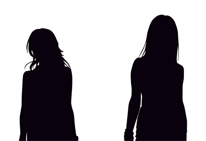 Silhouettes of two young women facing opposite directions