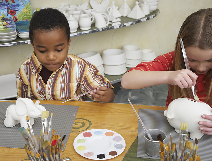 Boy and Girl in Pottery Studio, by Masterfile - Radius / Design Pics