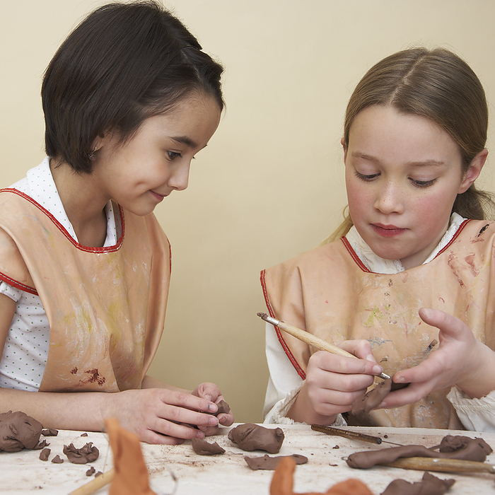 Children in Pottery Studio, by Masterfile - Radius / Design Pics