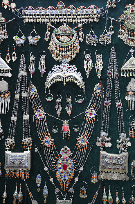 Jewelry Shop, close-up of collection of Islamic, Uzbek and Karakalpak jewelry displayed at the Tilla-Kari Mosque (completed in 1660) at Registan Square; Samarkland, Uzbekistan, by Richard Maschmeyer / Design Pics