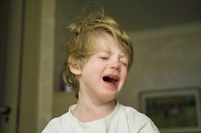 Portrait of a 4-year-old boy crying at his home; Lincoln, Nebraska, United States of America, by Joel Sartore Photography / Design Pics
