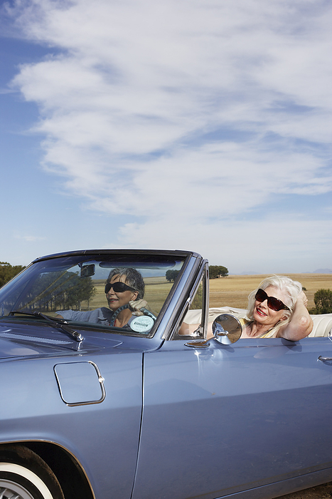 Women on Road Trip, by Masterfile / Design Pics