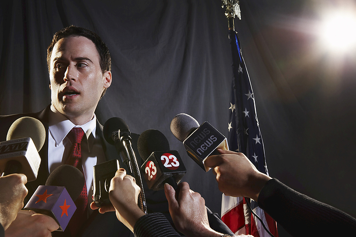 Reporters Interviewing Politician, by Masterfile / Design Pics