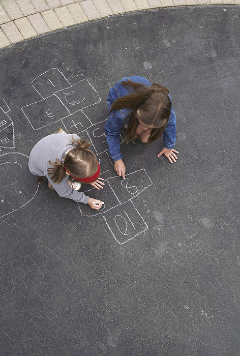 Girls Drawing with Chalk, by Masterfile / Design Pics