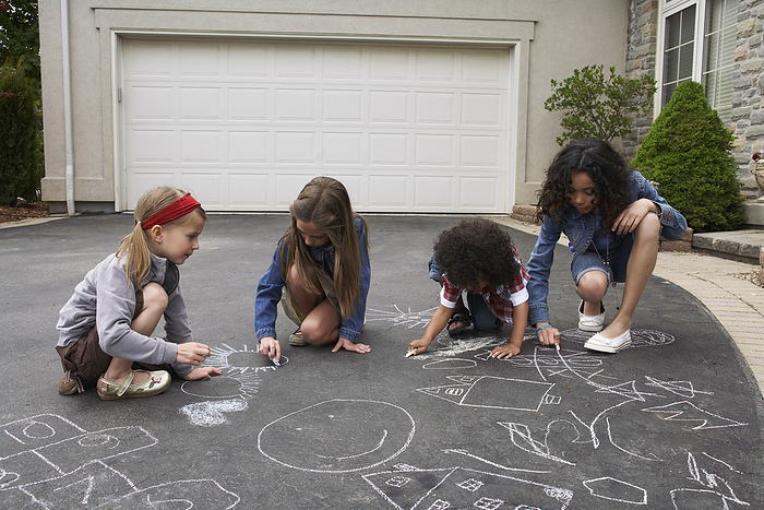 Children Drawing with Chalk, by Masterfile / Design Pics
