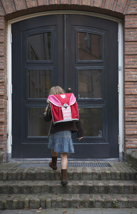 Girl Going To School, by Masterfile / Design Pics