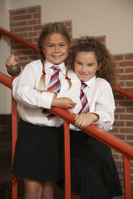 Portrait of Girls Wearing school Uniforms, by Masterfile / Design Pics