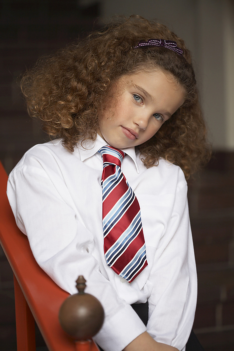 Portrait of Girl Wearing School Uniform, by Masterfile / Design Pics