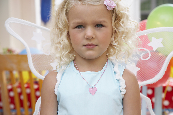Girl at Birthday Party, by Masterfile / Design Pics