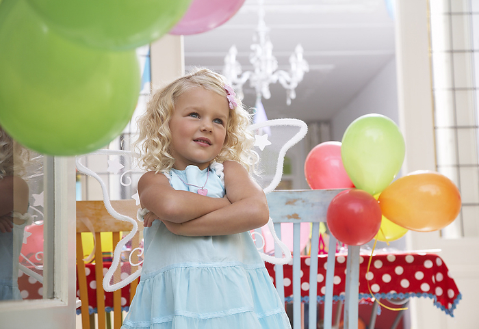 Girl at Birthday Party, by Masterfile / Design Pics
