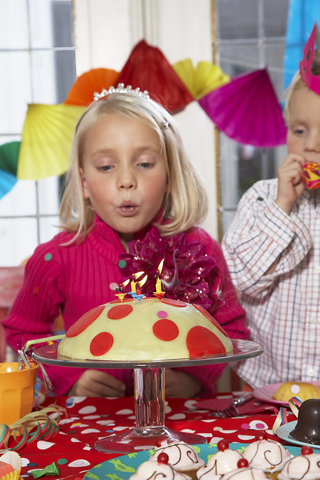 Children at Birthday Party, by Masterfile / Design Pics