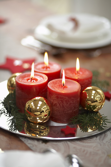 Christmas Candles at Dinner Table, by Masterfile / Design Pics
