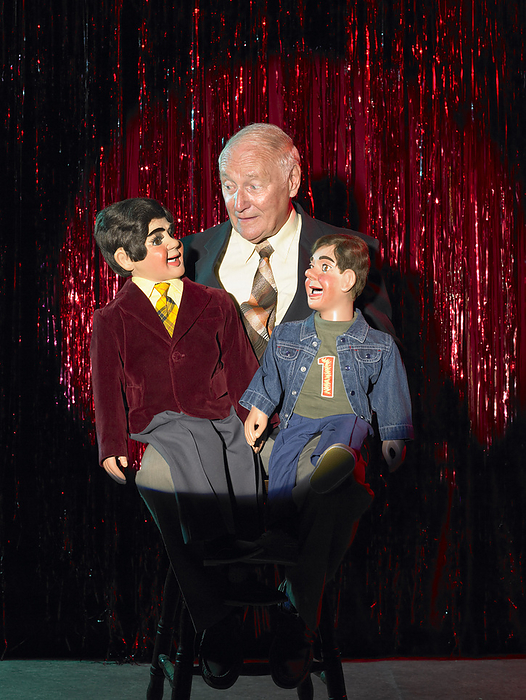 Ventriloquist on Stage, by Masterfile / Design Pics