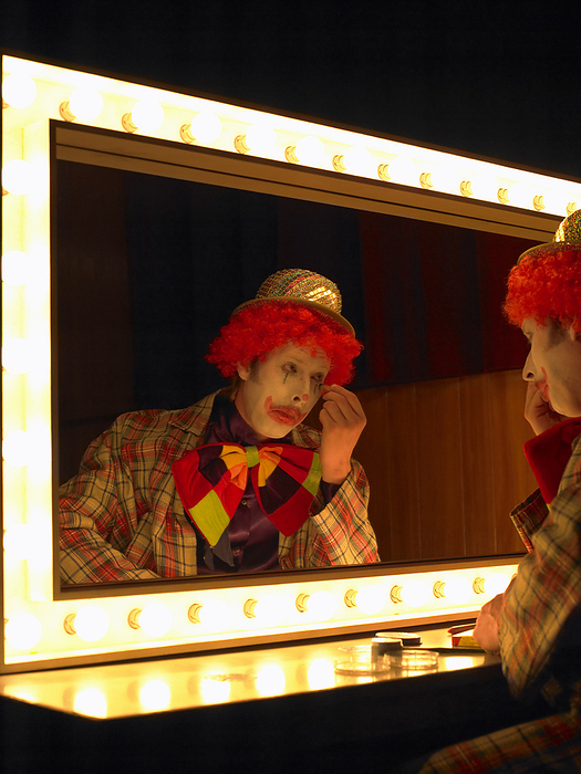 Clown Looking in Mirror, by Masterfile / Design Pics